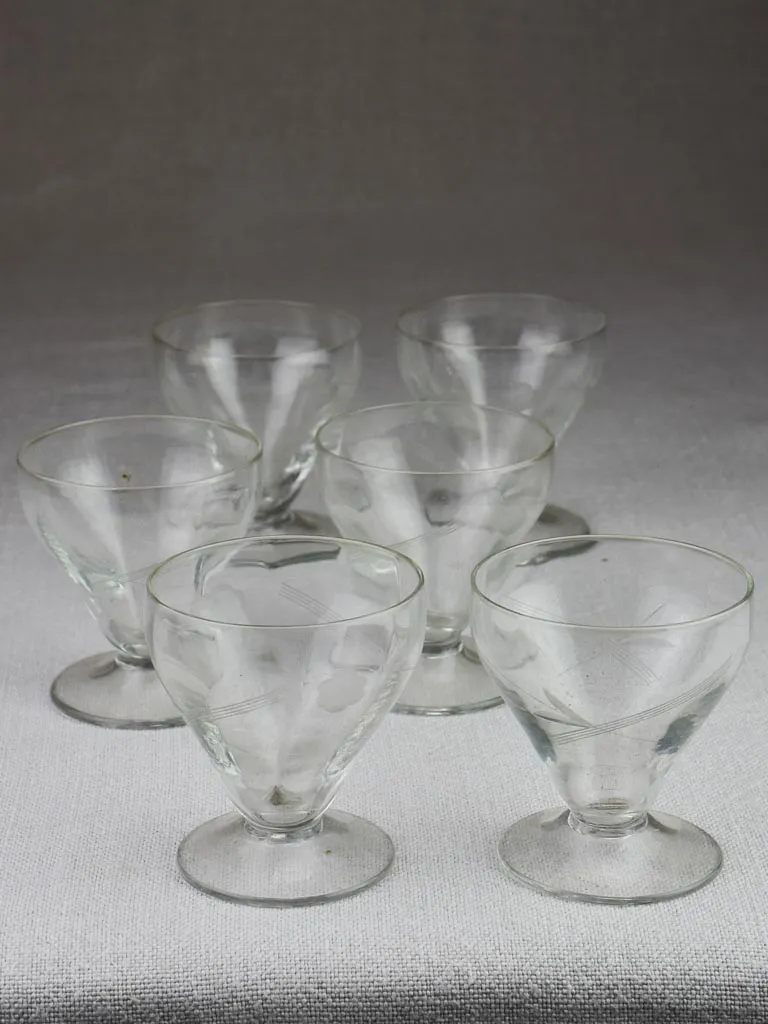 Six 1950's aperitif glasses with etched flowers